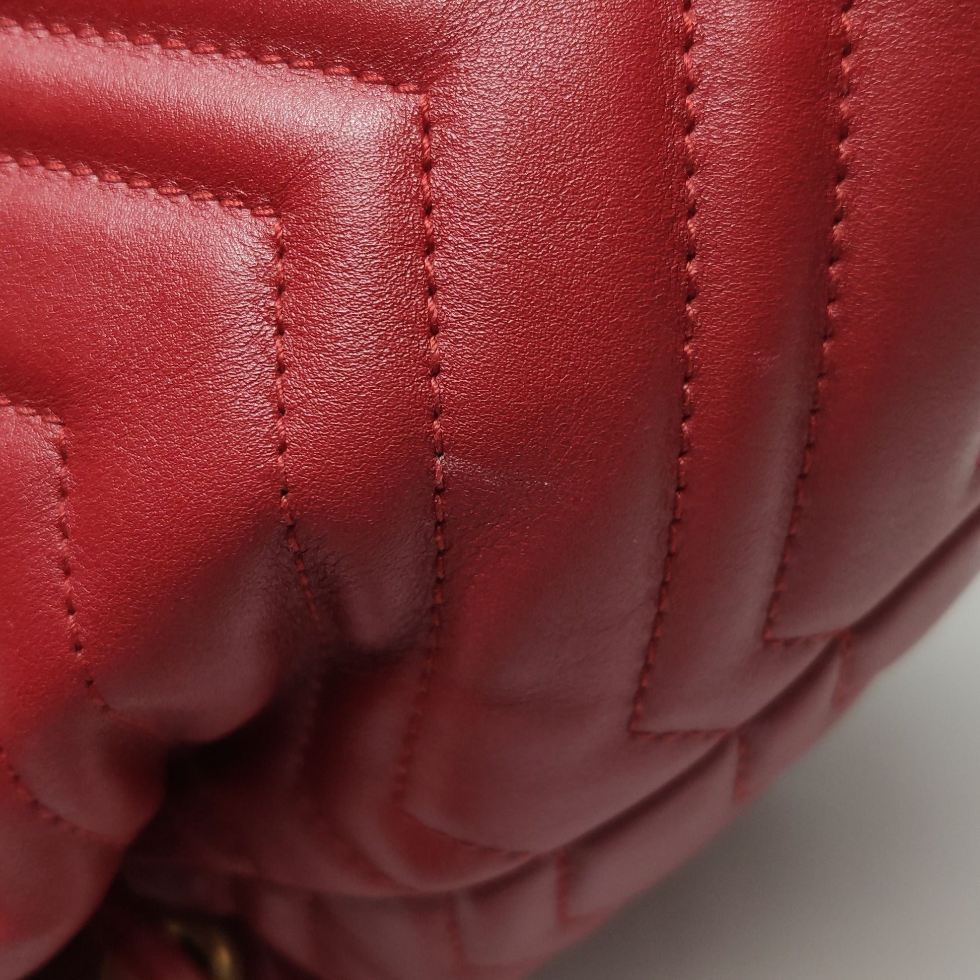 Gucci GG Marmont Leather Solid V-stitched GG Logo Drawstring Backpack 250503781176129