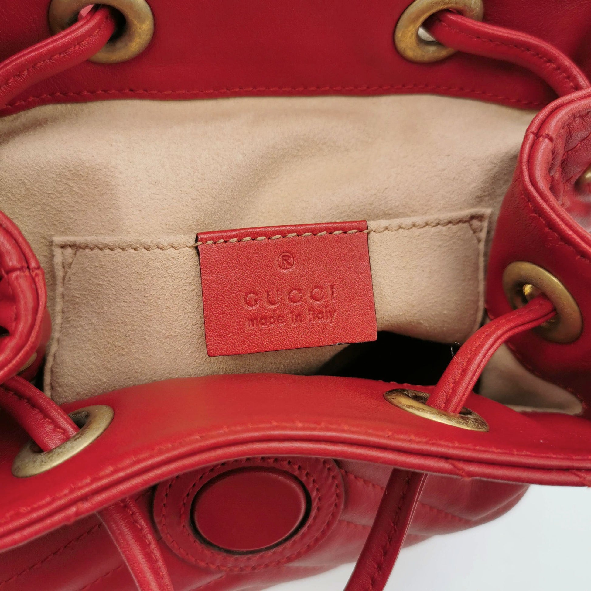 Gucci GG Marmont Leather Solid V-stitched GG Logo Drawstring Backpack 250503781176129