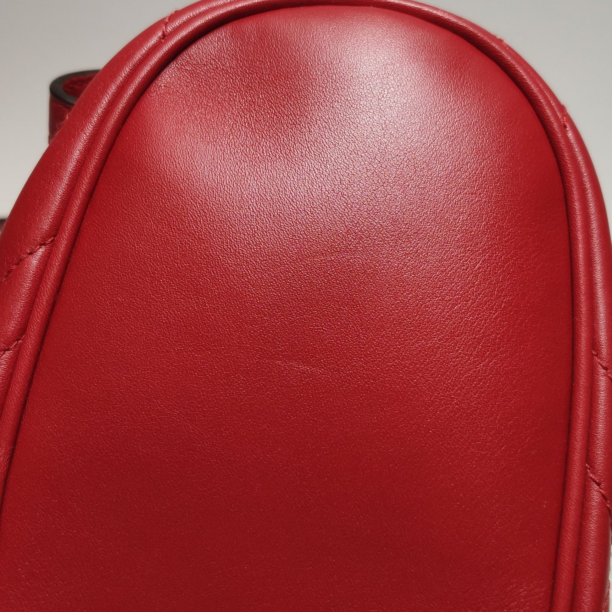 Gucci GG Marmont Leather Solid V-stitched GG Logo Drawstring Backpack 250503781176129