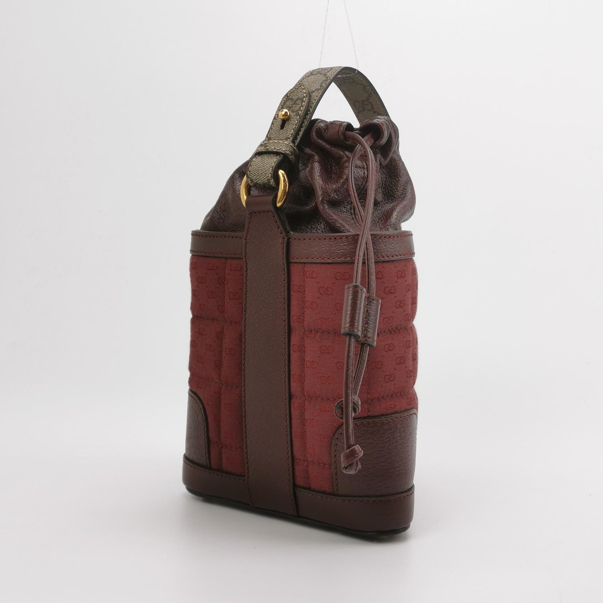 Gucci Quilted GG Logo Drawstring Crossbody Bag 047852700582