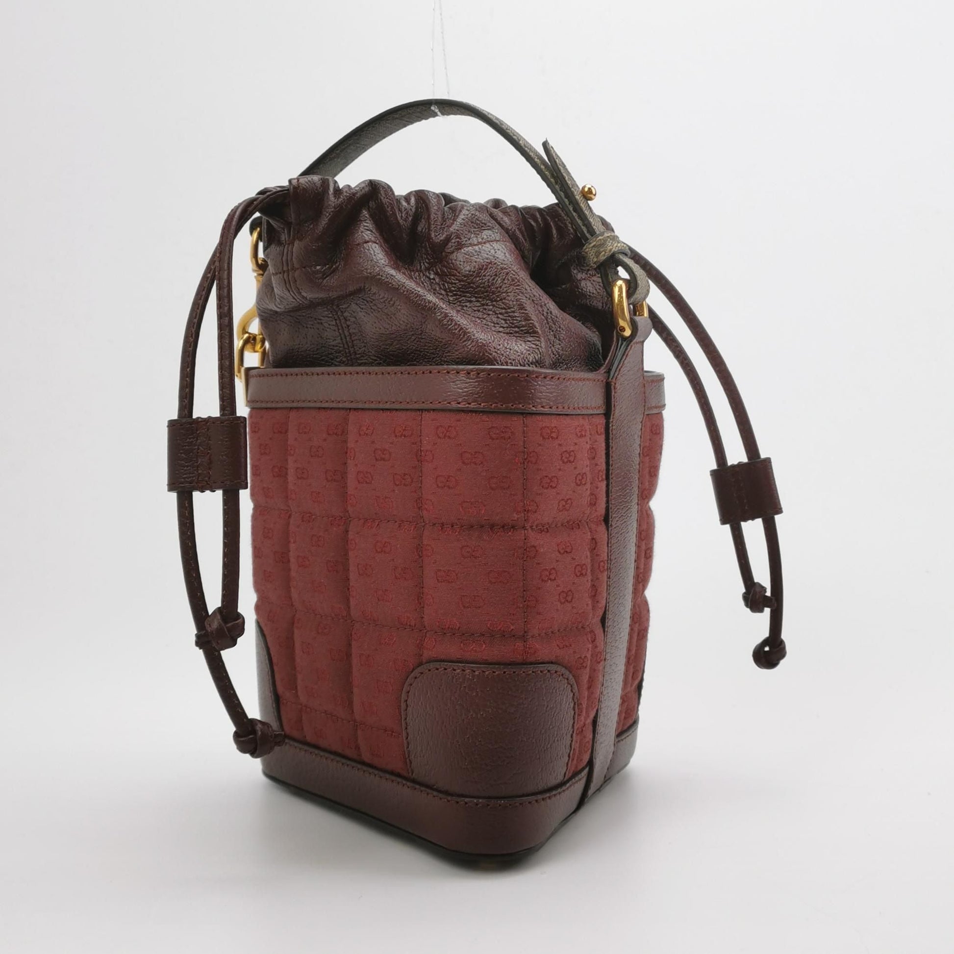 Gucci Quilted GG Logo Drawstring Crossbody Bag 047852700582