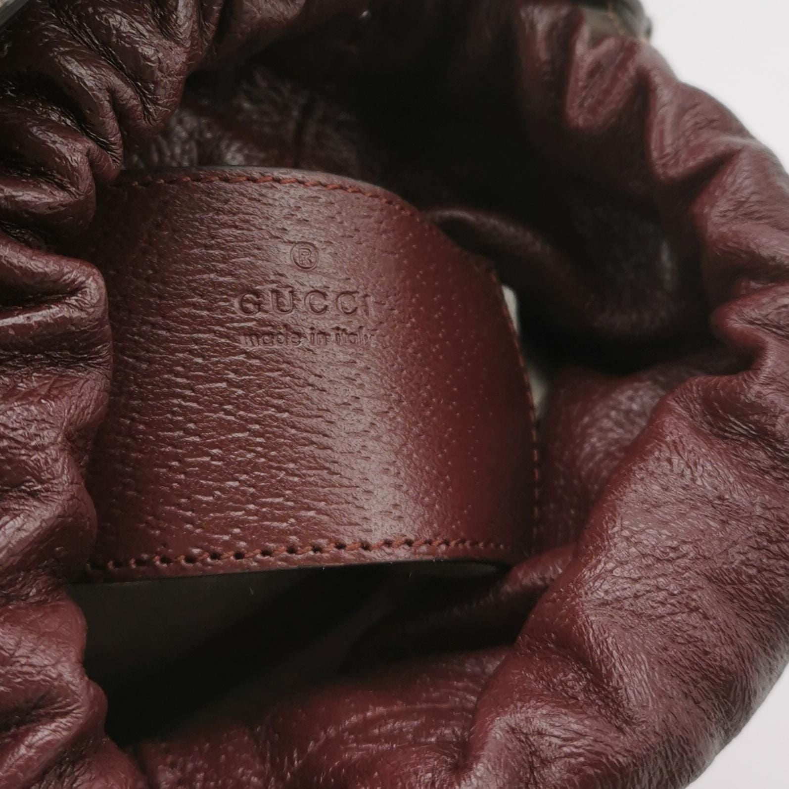 Gucci Quilted GG Logo Drawstring Crossbody Bag 047852700582