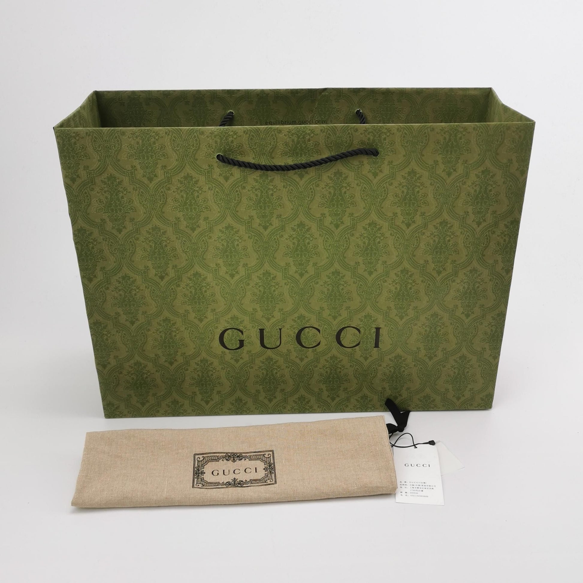 Gucci Quilted GG Logo Drawstring Crossbody Bag 047852700582