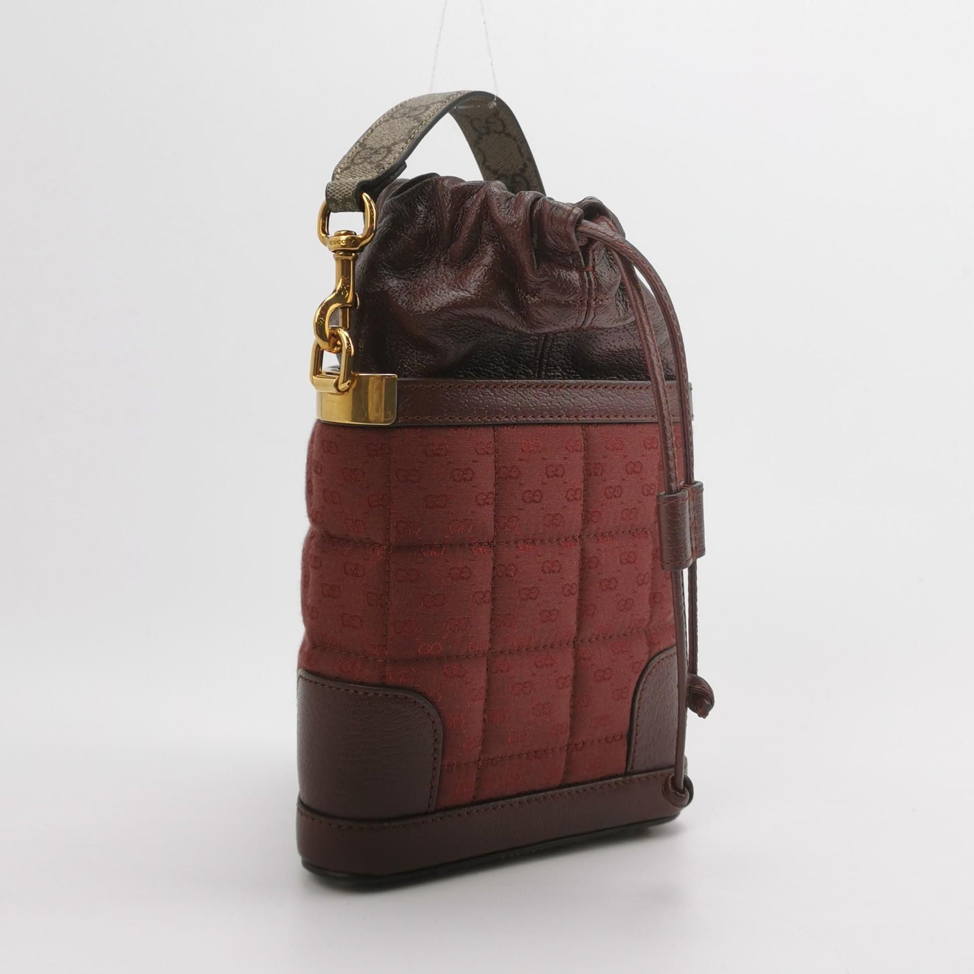 Gucci Quilted GG Logo Drawstring Crossbody Bag 047852700582