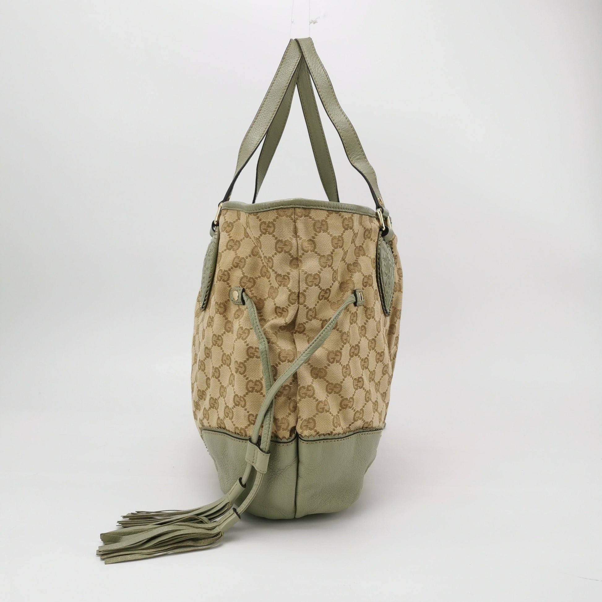 Gucci GG Canvas Fringe Shoulder Bag 24122178991236