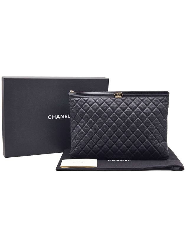 Chanel A84407 Black Caviar Champagne Gold Metal Boy Large Clutch Unit 29
