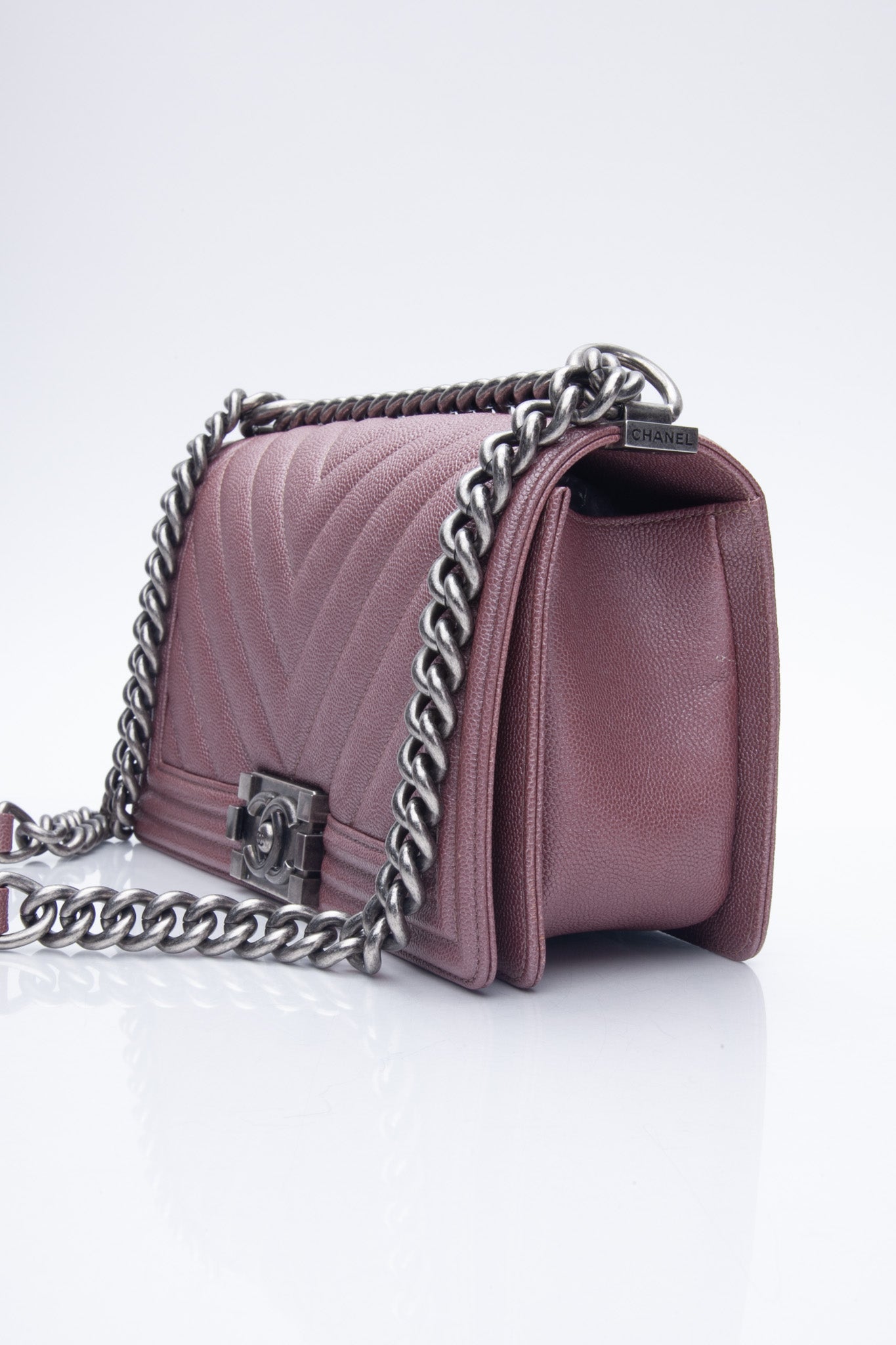 CHANEL Dark Pink Metallic Caviar Chevron Quilted Medium Boy Flap bag