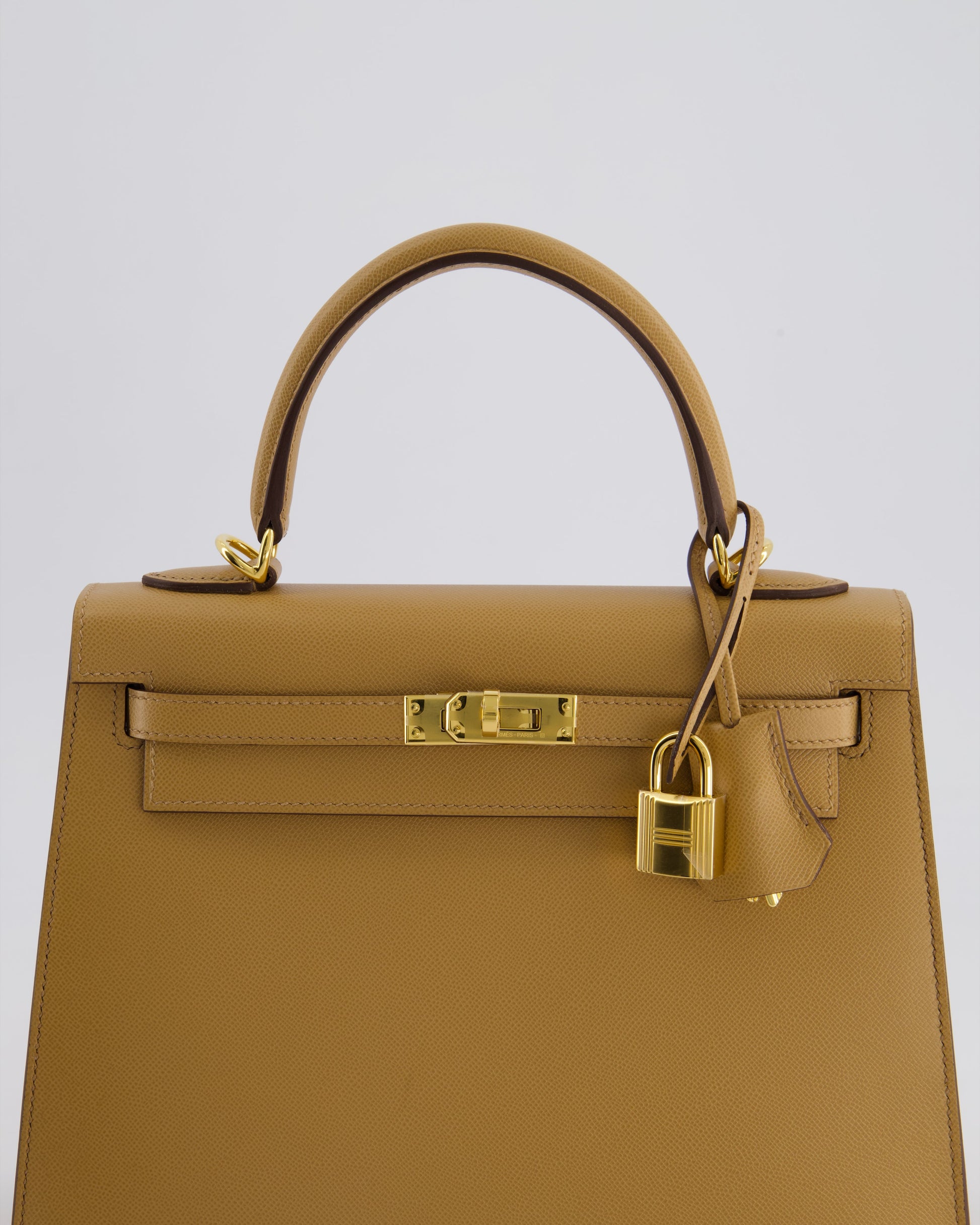 Hermes Verso Kelly Sellier 25cm Bag in Biscuit Madame Leather, Blanc Interior with Gold Hardware