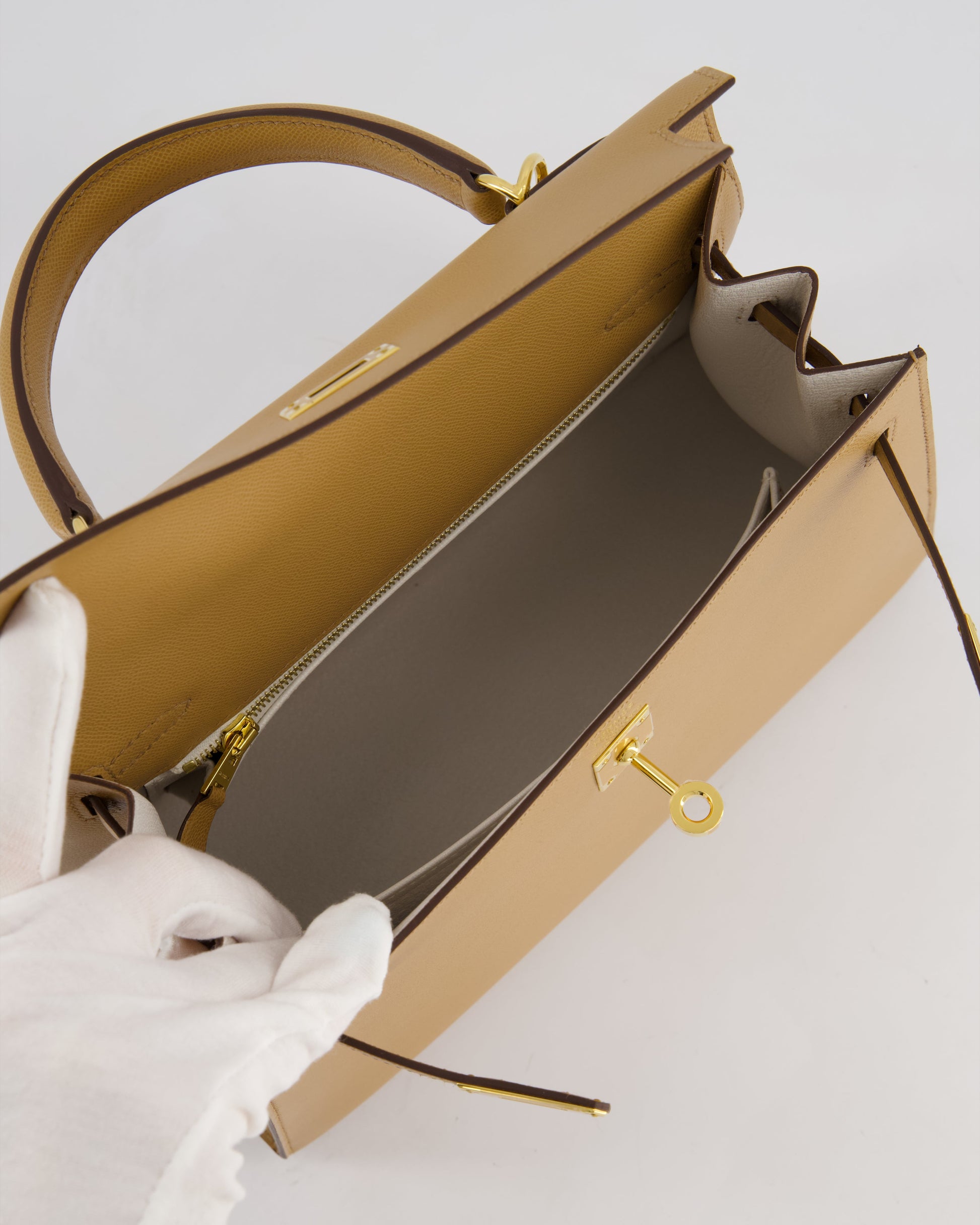 Hermes Verso Kelly Sellier 25cm Bag in Biscuit Madame Leather, Blanc Interior with Gold Hardware