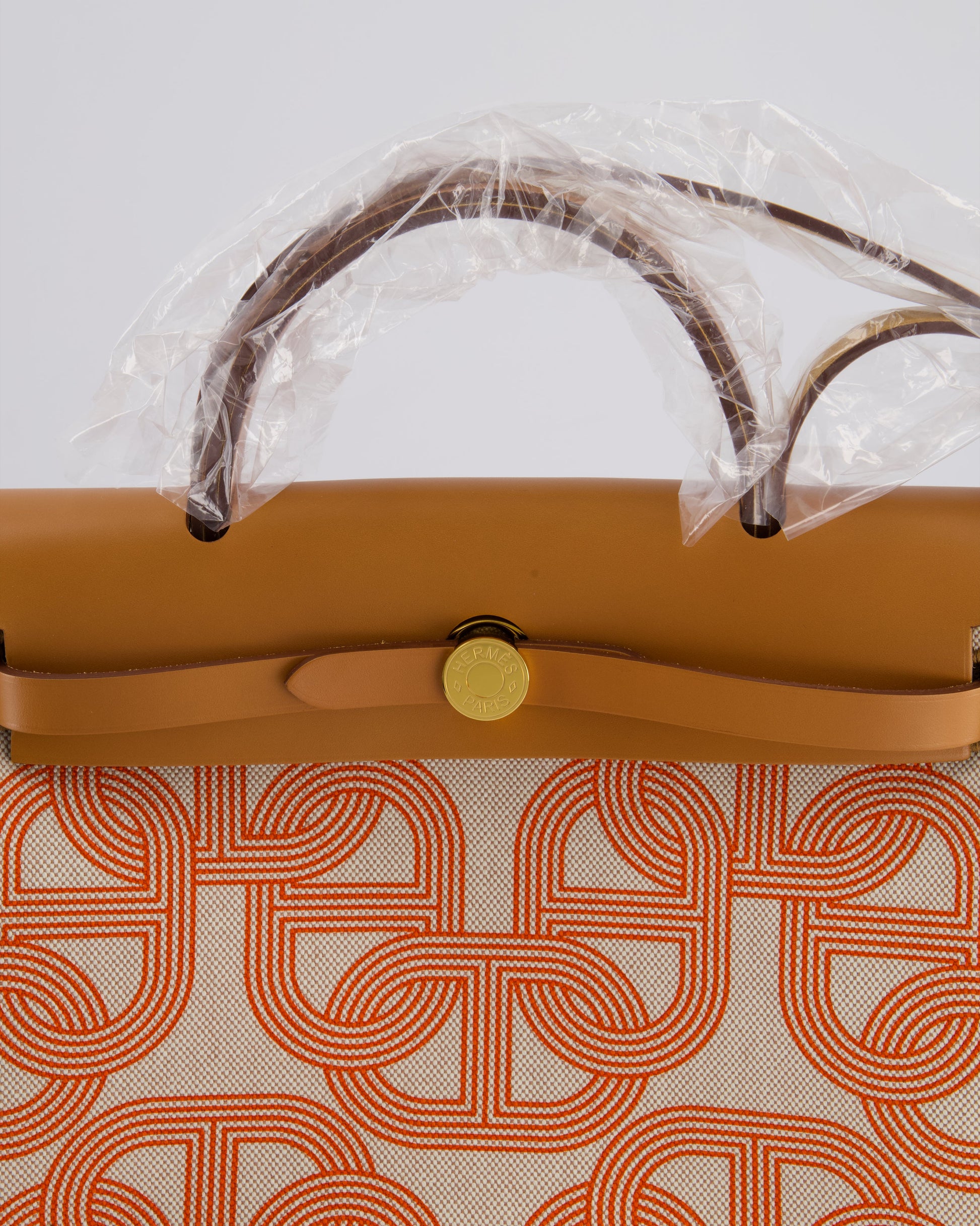 Hermes Herbag Zip Retourne 31 Chaine D'Ancre Bag in Orange Mécano & Ecru Quadrille Toille Canvas, Natural Hunter Leather with Gold Hardware