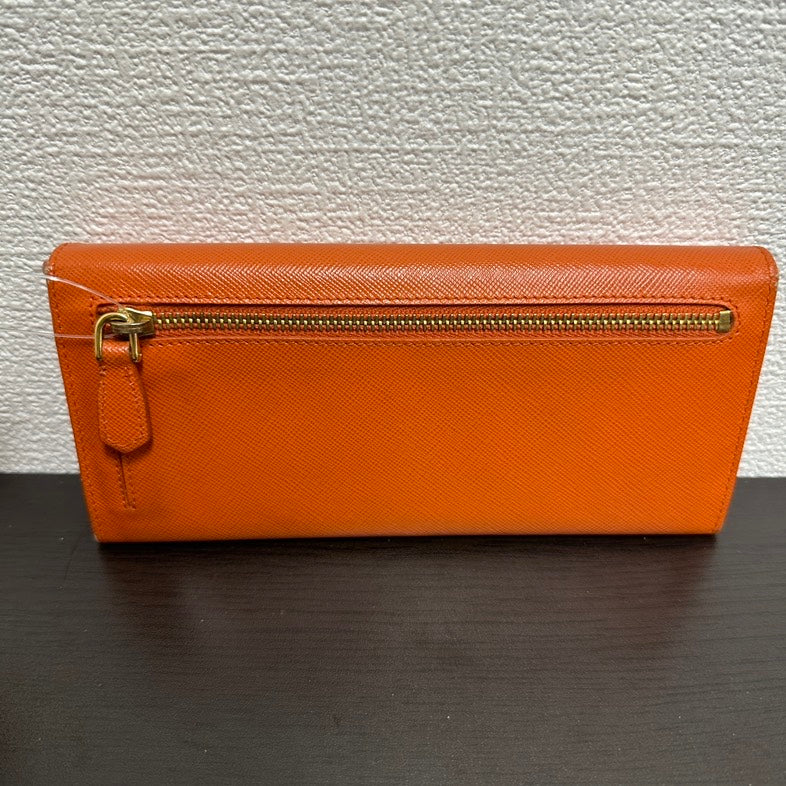 Pre-loved Prada Wallet V Orange Saffiano Leather Wallet