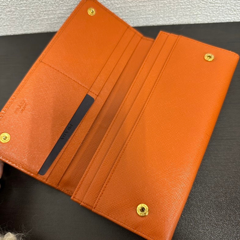 Pre-loved Prada Wallet V Orange Saffiano Leather Wallet